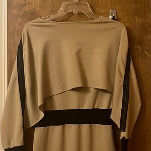 A Beige and black Zip Off Cape dress